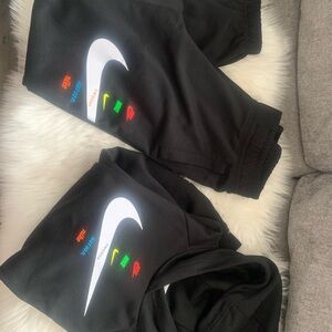 Nike womens Black Sweatpants with Multicolor Accents